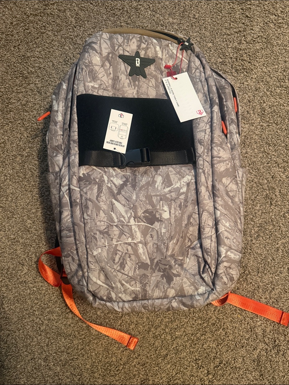 Camouflage Gray Backpack with Orange Accents